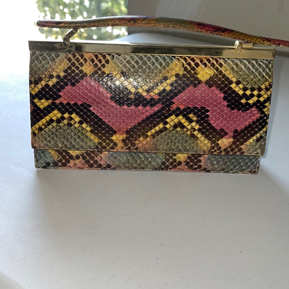 Judith Leiber snake skin clutch